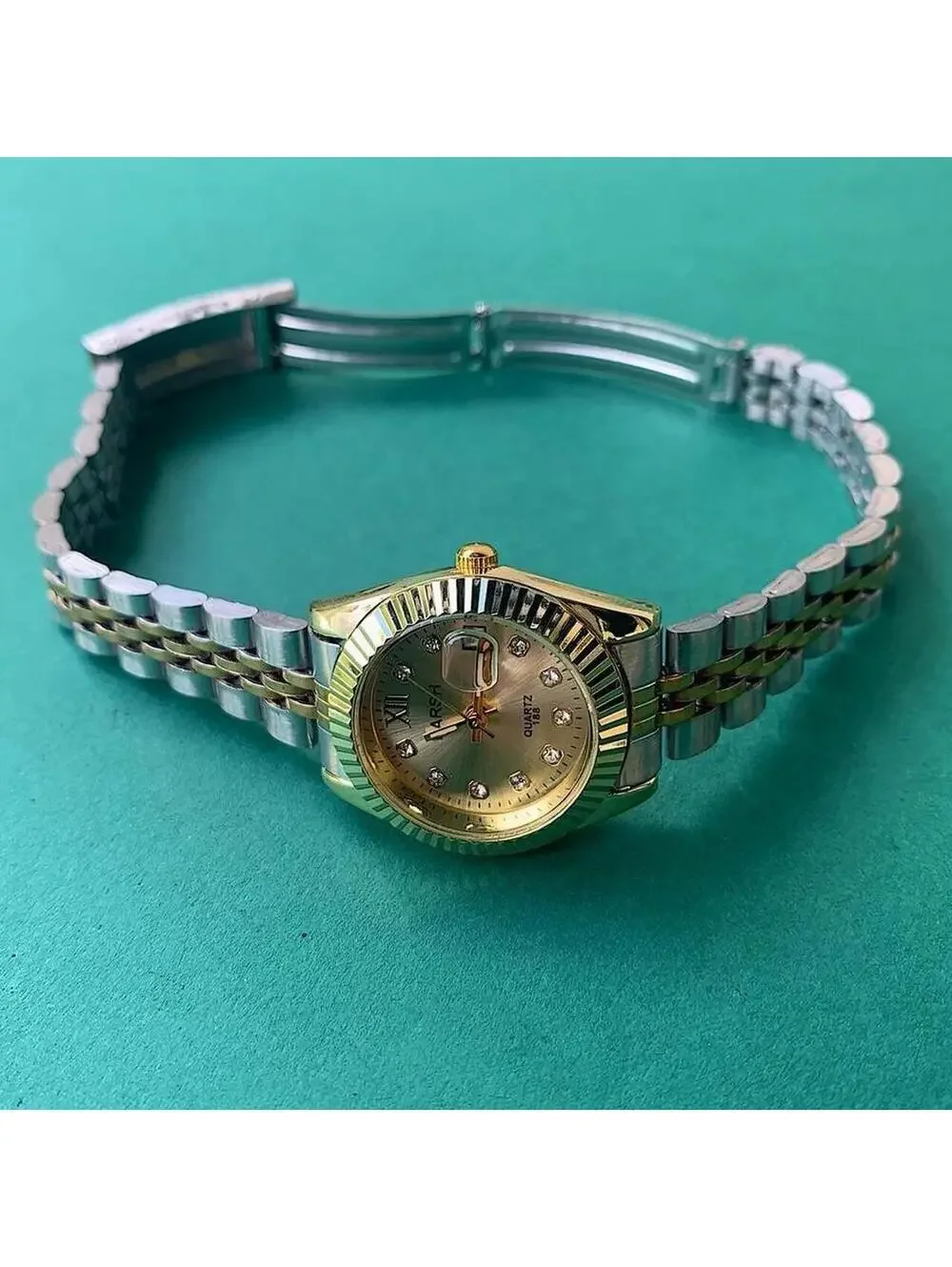 Classy Y2K 2000s style Silver and Gold watch with diamond accents. Nice quality